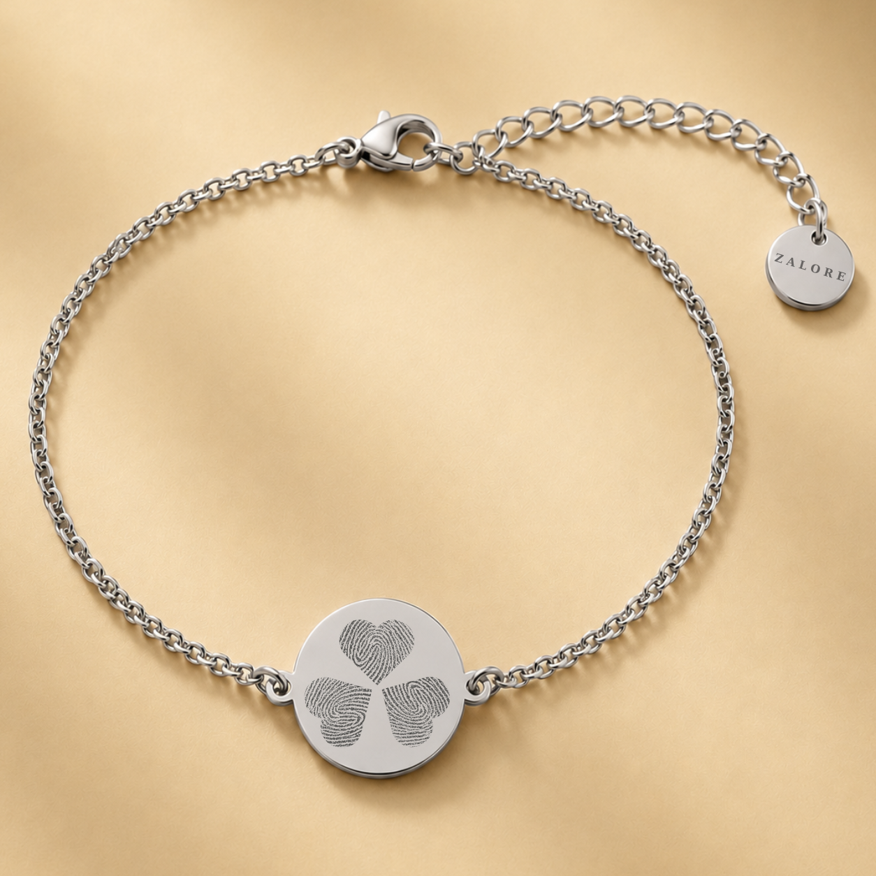 DRIE VINGERAFDRUKKEN MUNT ARMBAND